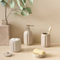Ceramiczny kubek na szczoteczki z reliefowym wzorem Colorama, beżowy - 5five
